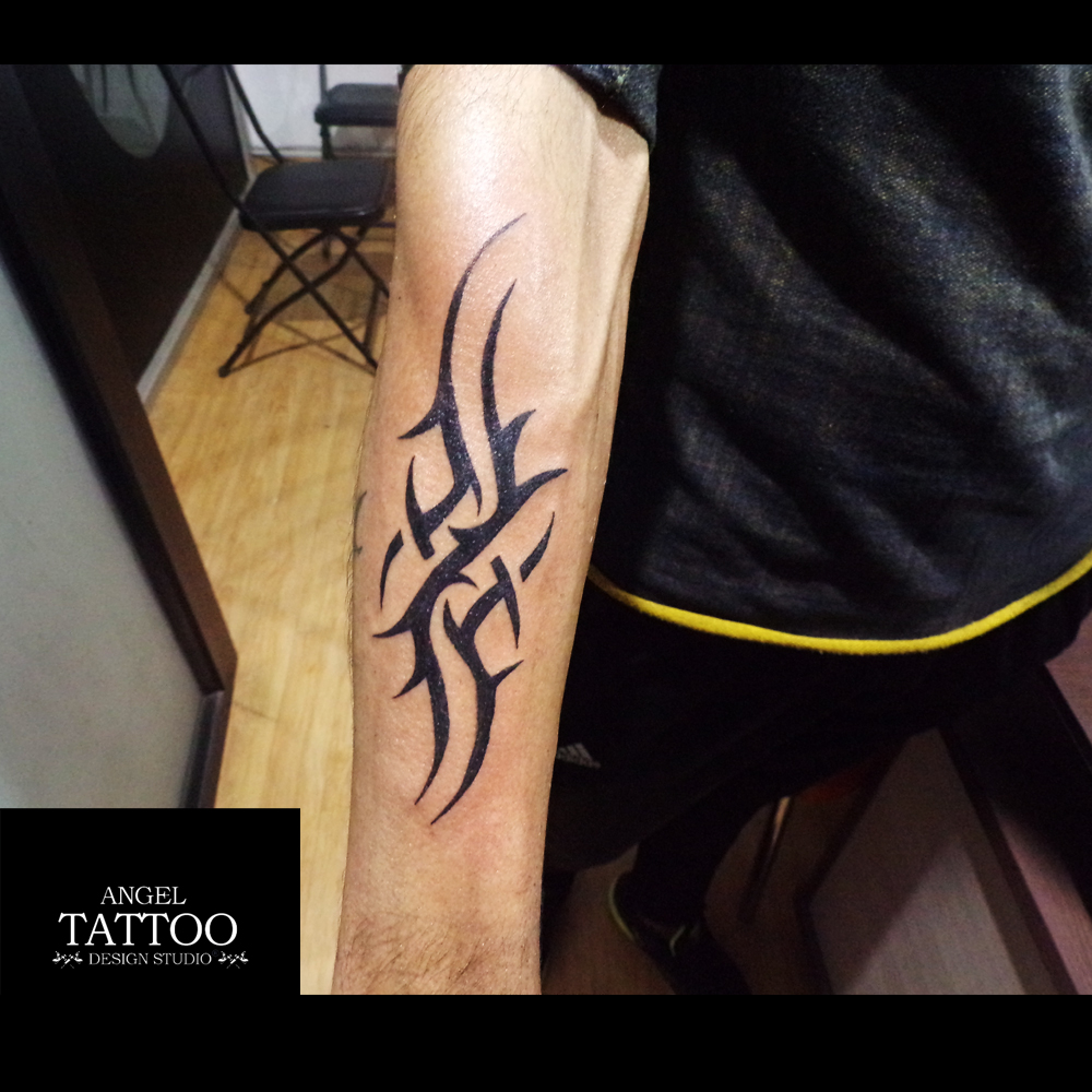 tribal tattoo forearm