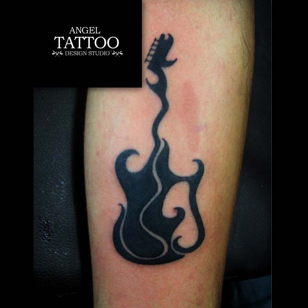 Small Guitar Tattoo Design for Music Lovers