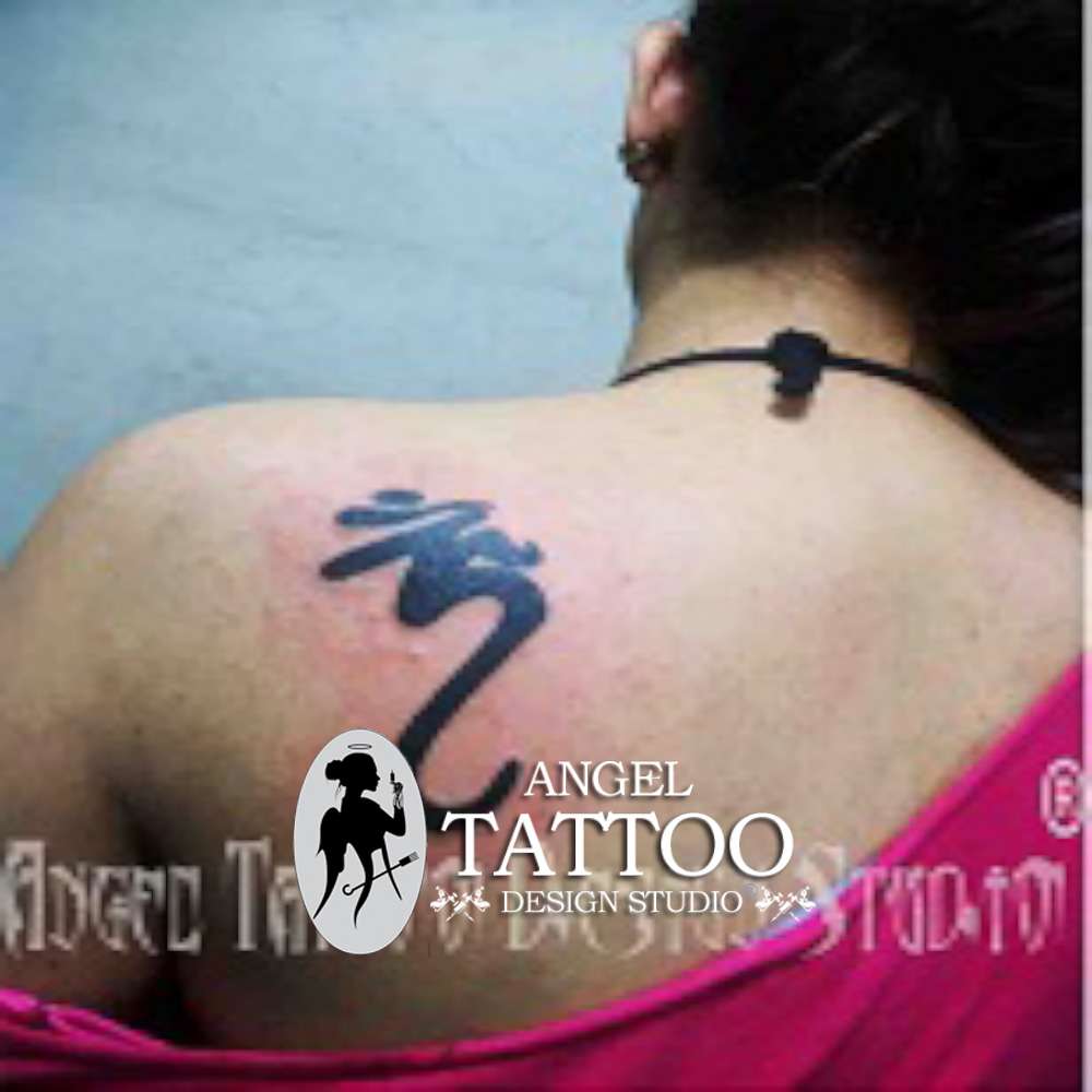 OM tattoos, om tattoo on back