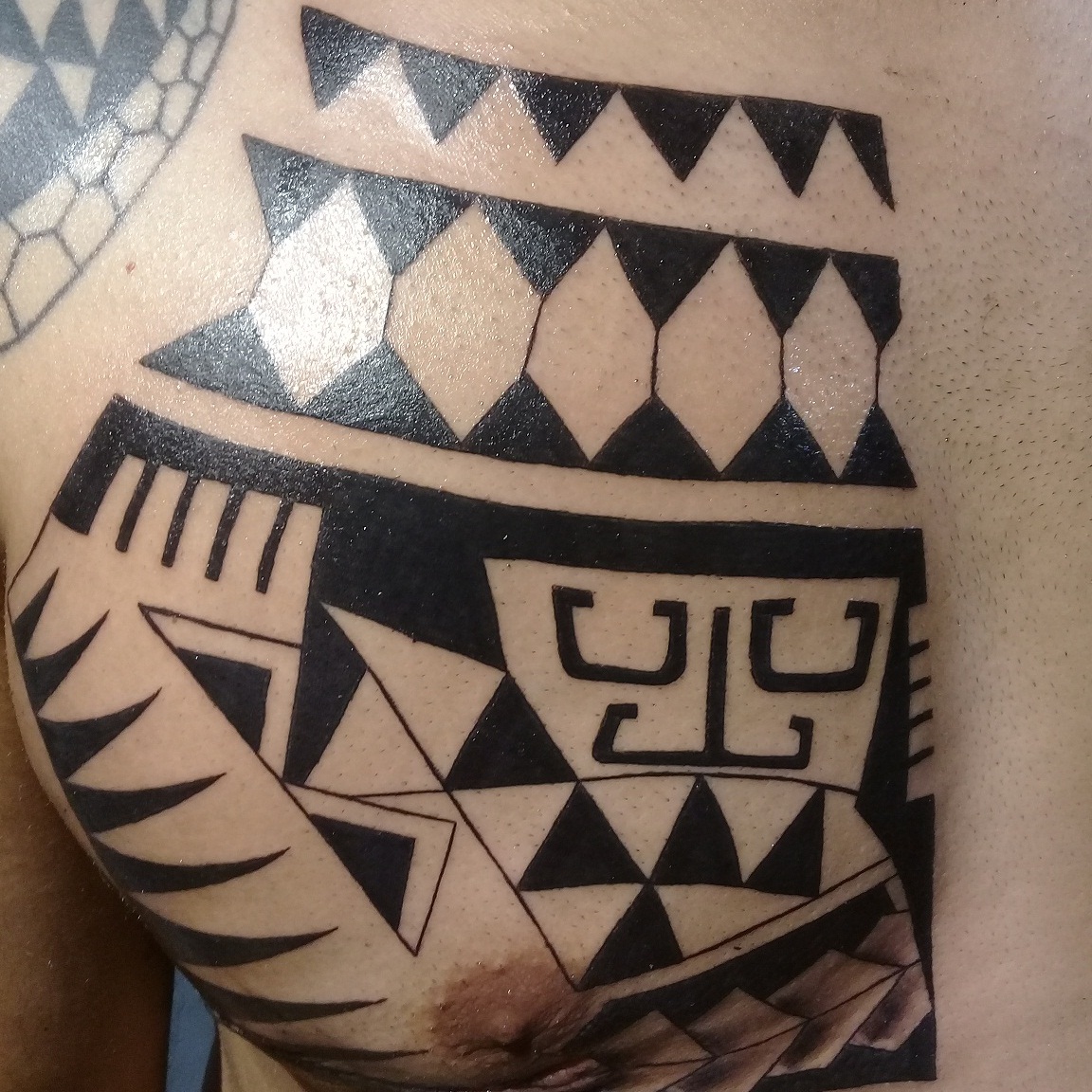 tribal tattoo, tattoo for men, tribal tattoo on chest
